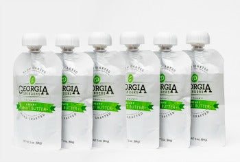 Georgia Green tea packaging on a white background
