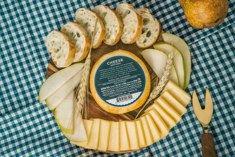 Bourbon Gouda from Wisconsin - House Cheese - Only $6.71! Order now at Weeks Honey Farm Fast shipping and excellent customer service.