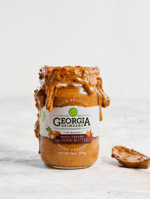 Jar of Georgia Grinders almond butter on a white background